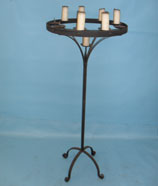 tall floor standing candelabra with hand scrolled feet